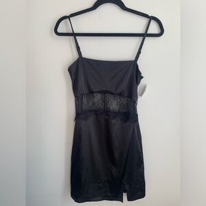 Women’s black slip dress with lace peek detailing, Size Medium